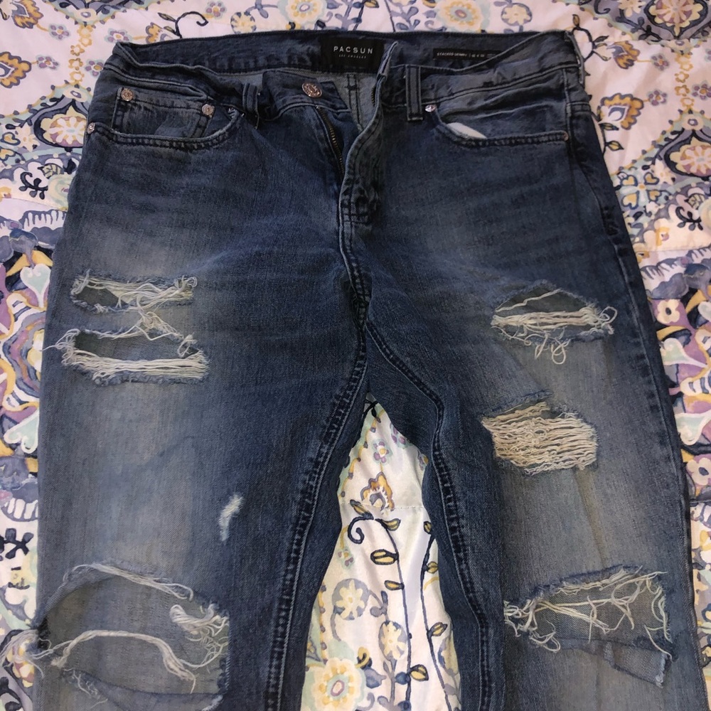 Dark washed blue jeans.